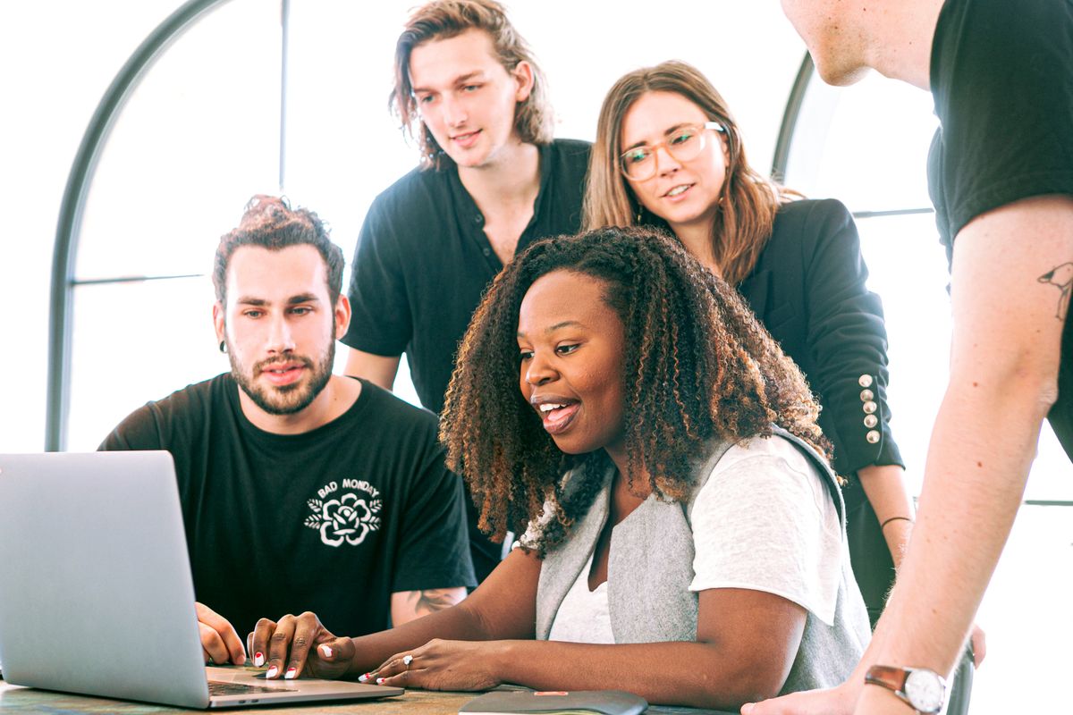 Colleagues working together in a bright, modern office